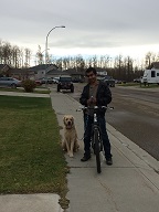 Amila taking Friday for a run with his bike.
